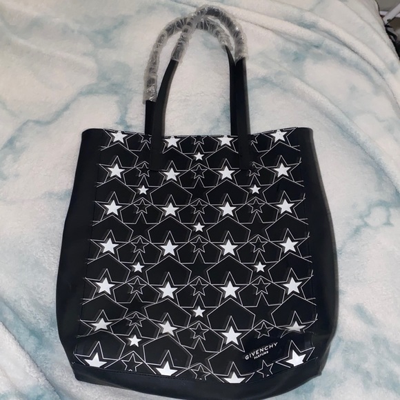 Givenchy Handbags - NWOT Givenchy perfumes black and white stars bag